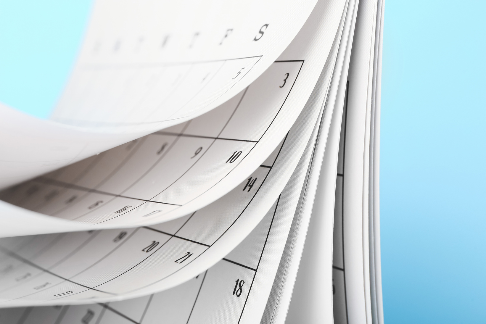 Flip Calendar on Color Background, Closeup
